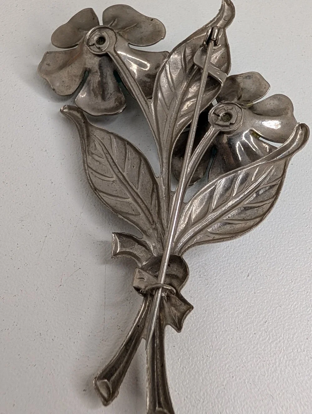 Silver Tone Floral Brooch with Molded Turquoise Resin Roses